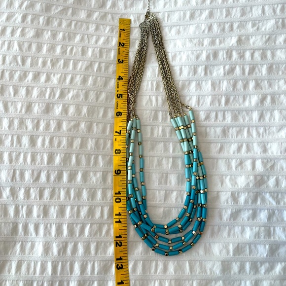 Turquoise necklace with gold accents in good condition. - Picture 2 of 3